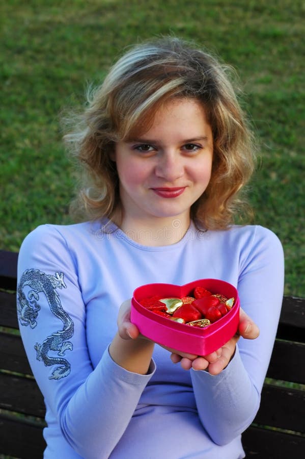 Girl with chocolates box