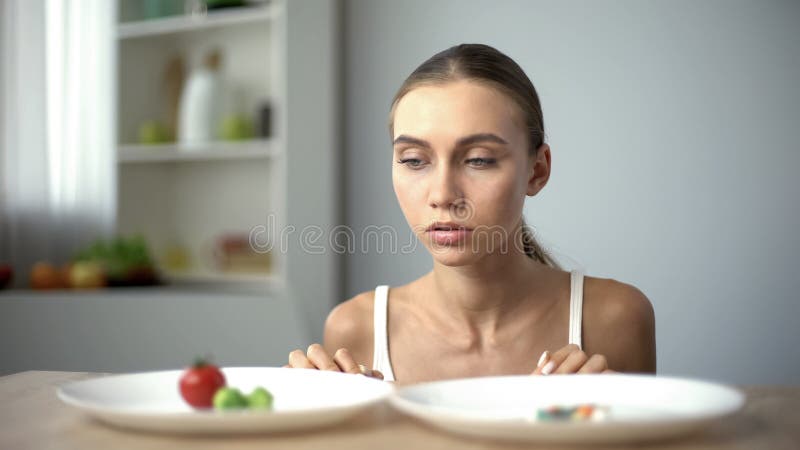 Girl Choosing between Vegetables and Pills, Healthy Diet Vs Weight Loss ...