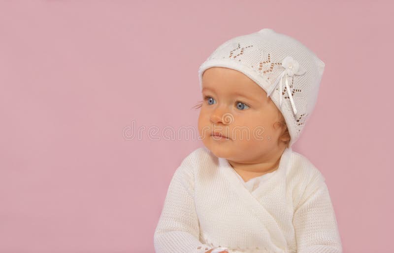 Girl in christening outfit