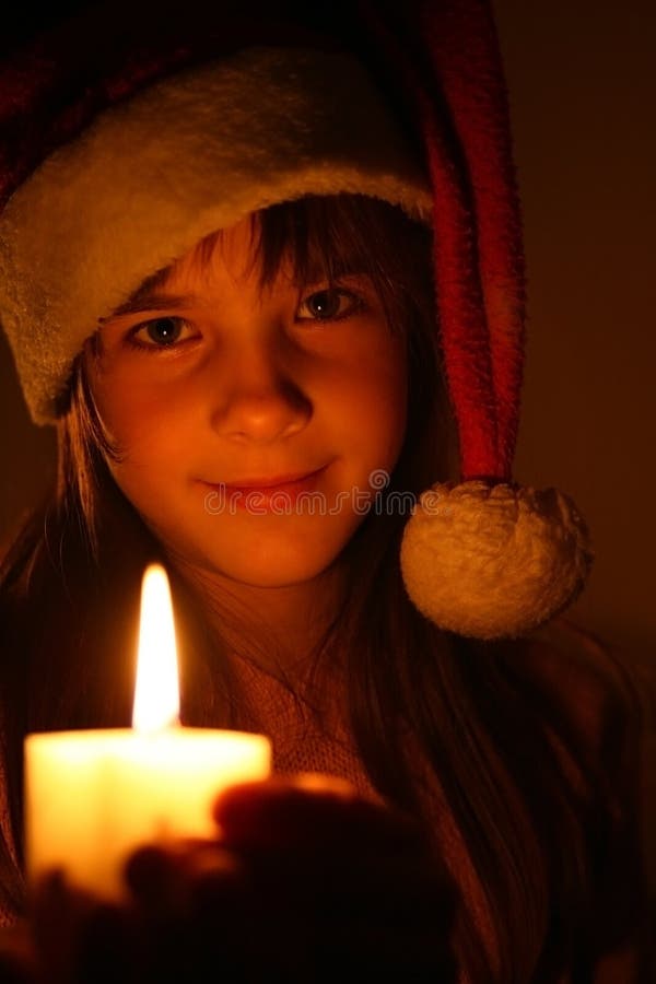 Girl with christmas candle