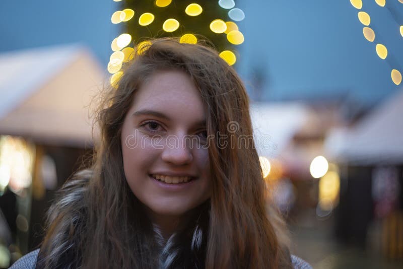 Girl in Christmas Traditional Market Decorated with Holiday Lights in ...