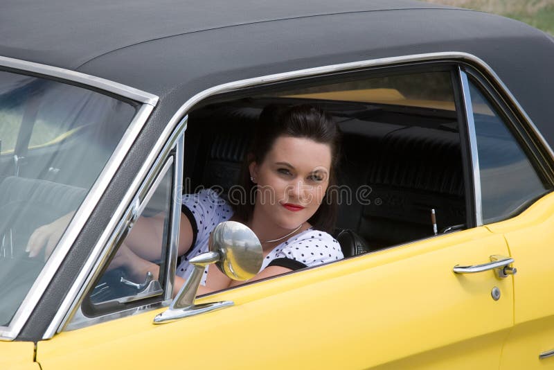 Girl and classic car