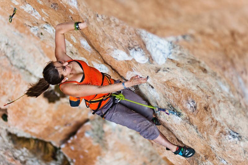 Girl Climber Climbs on Rock. Stock Image Image of female, inspire