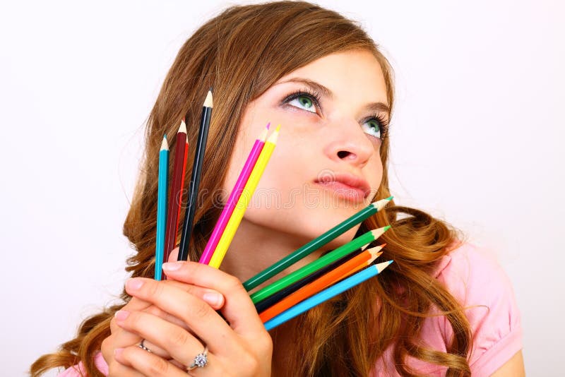 The girl with color pencils