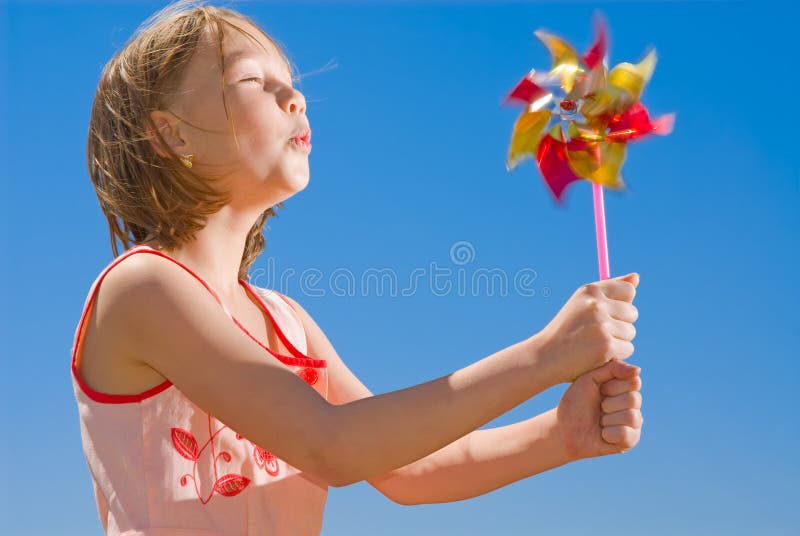 Girl with colored pinwheel
