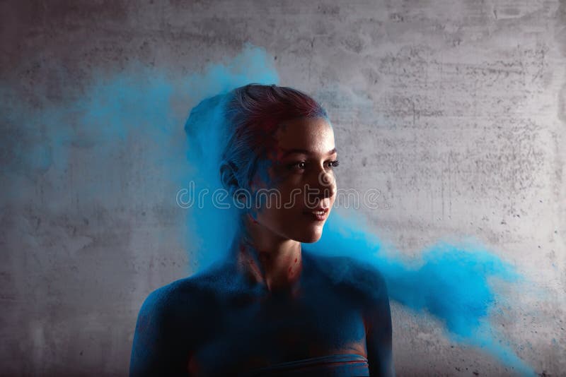Girl with colored powder stock image. Image of holi, fashion 45683583