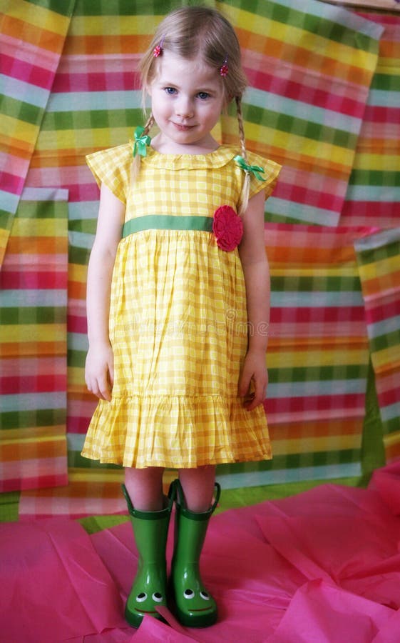 Girl in Colorful Dress and Boots Stock Photo - Image of braids, smile ...