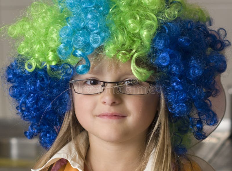 Girl in colorful funny wig stock image. Image of colorful 6566671