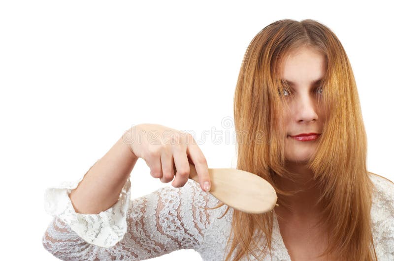 Girl combing her hair