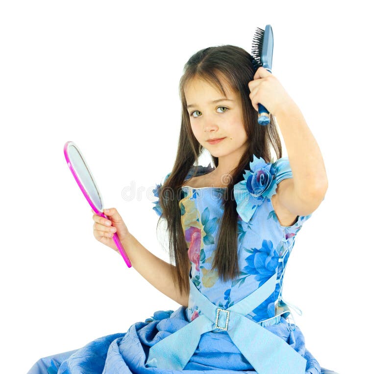 The girl combs hair stock photos