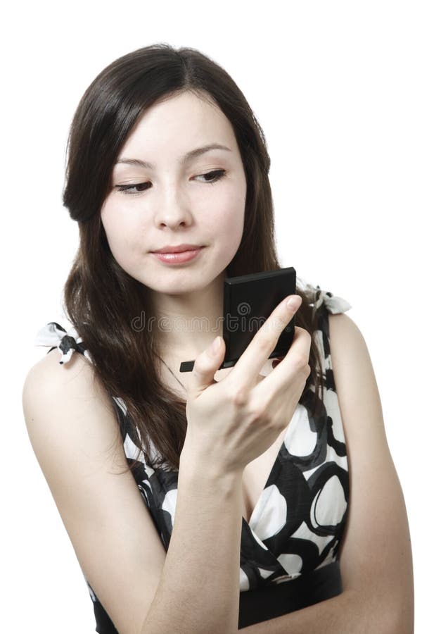 Girl with compact mirror royalty free stock photography