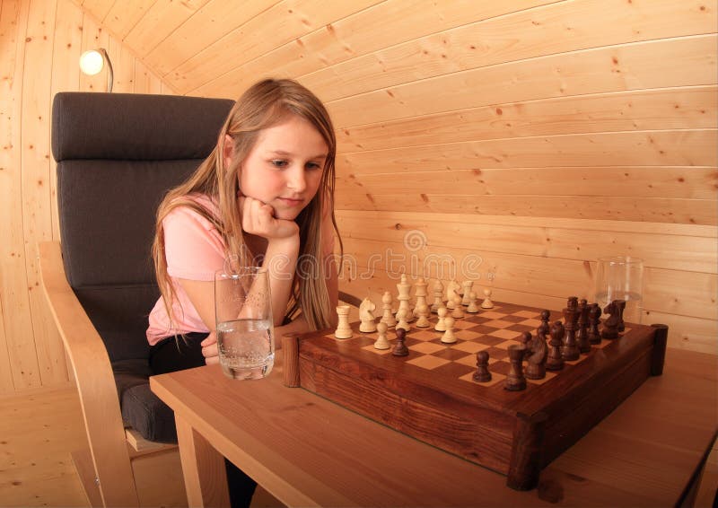 Young female concentrating hard of her next move at a chess game Stock  Photo - Alamy