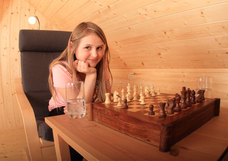 woman studying the next chess move, Stock image