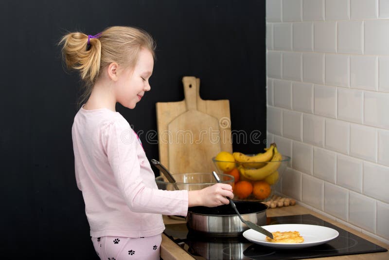 Girl Cooking Pancakes in Kitchen Stock Photo Image of cute, nutrition