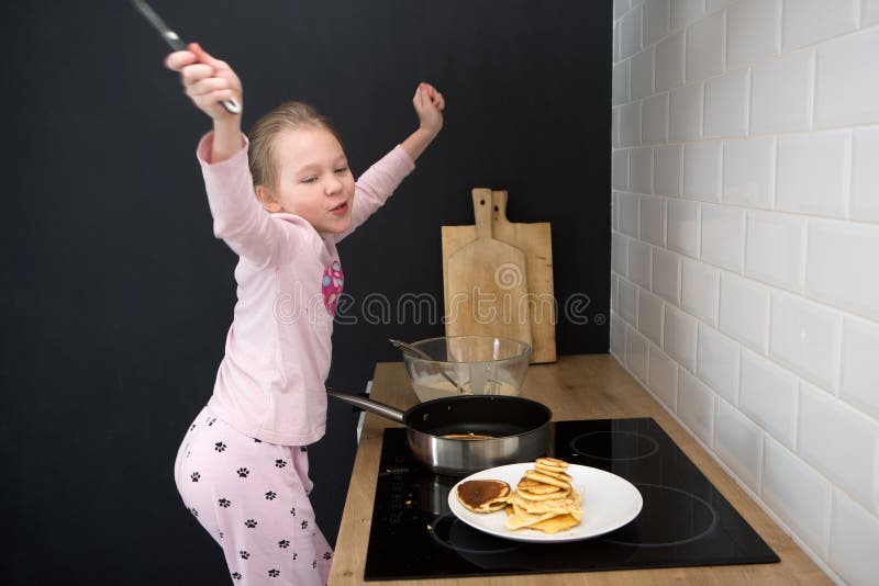 Girl Cooking Pancakes in Kitchen Stock Photo Image of baking