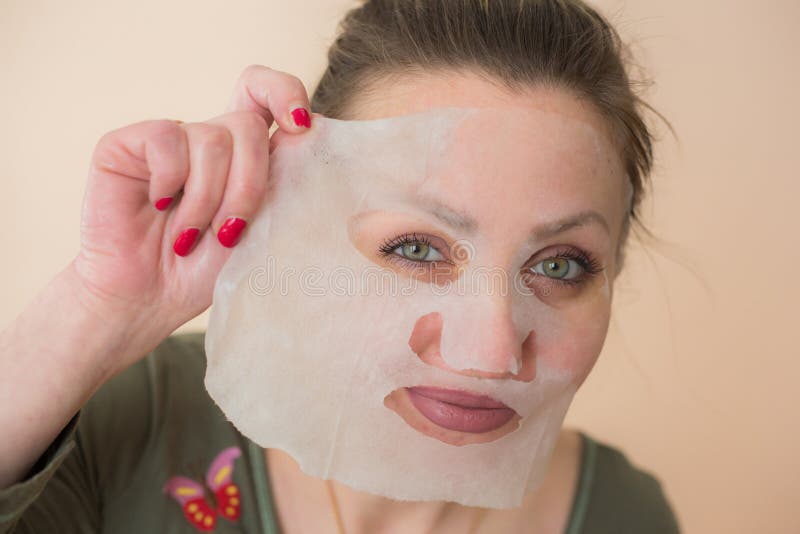 Girl in a Cosmetic Face Mask Stock Photo Image of mask, closeup