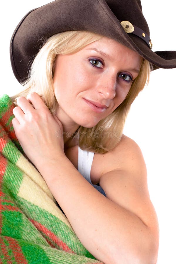 Girl in a cowboy hat with wrapped in a plaid