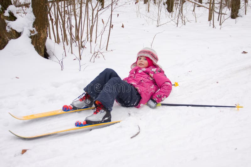 Girl cross-country skiing fell down