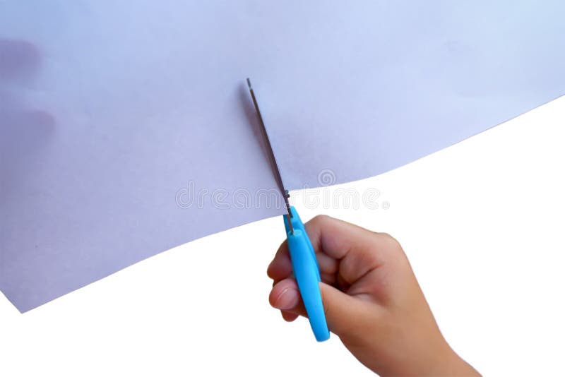 Close Up Of Hand Holding Scissors And Cutting Through Paper Stock