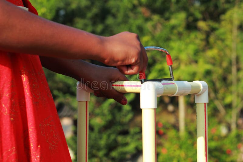Girl Cutting Pvc Pipe and Fitting with Cutter Tool Stock Image Image