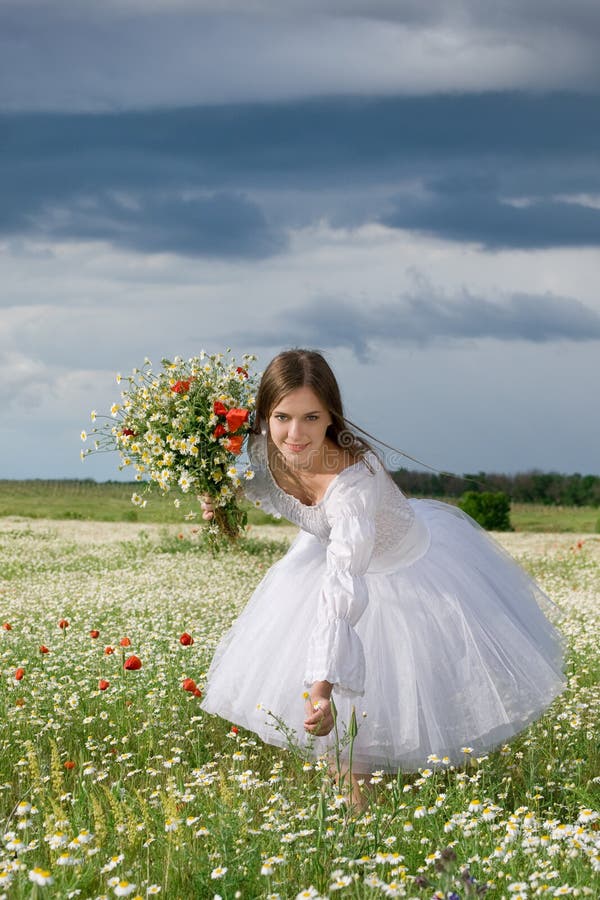 Girl in daisy field