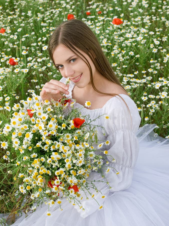 Girl in daisy field