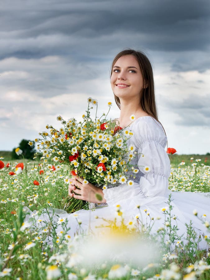 Girl in daisy field