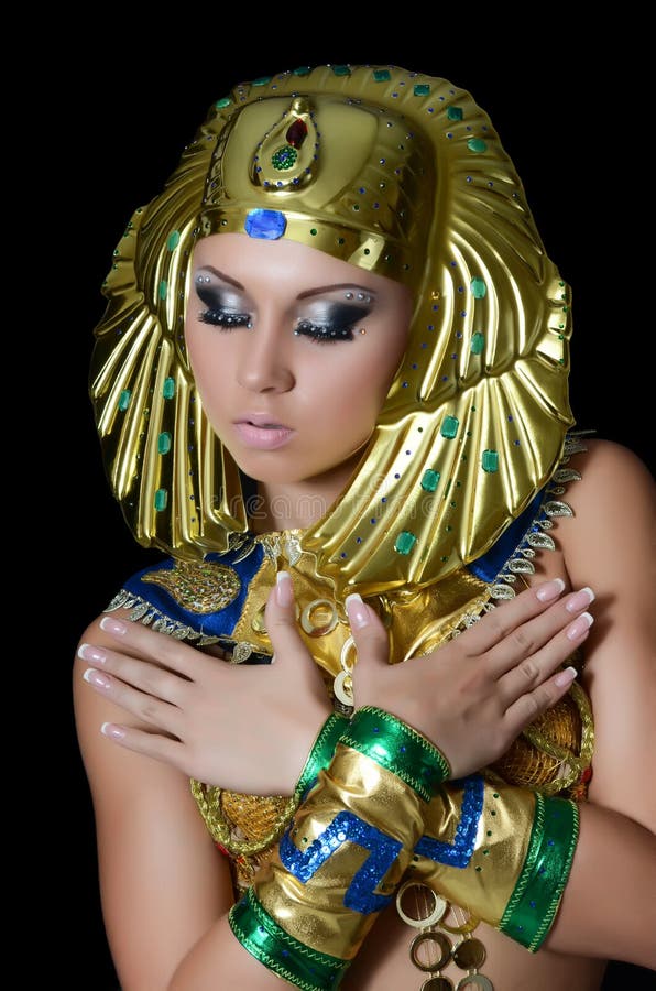 The girl-dancer in a costume of the Pharaoh