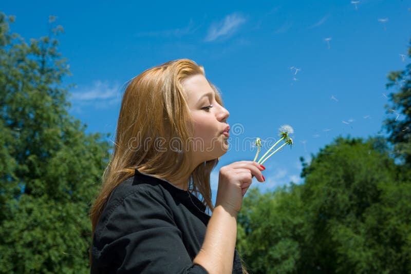 Girl and dandelion