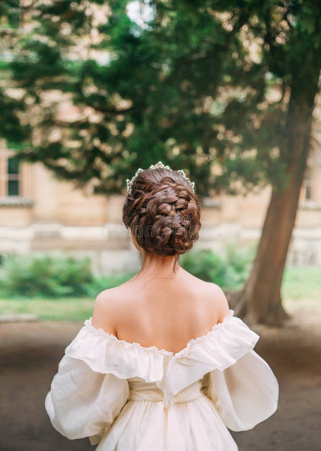 Girl with Dark Hair and Delicate Skin Shows Gorgeous Hairstyle from ...