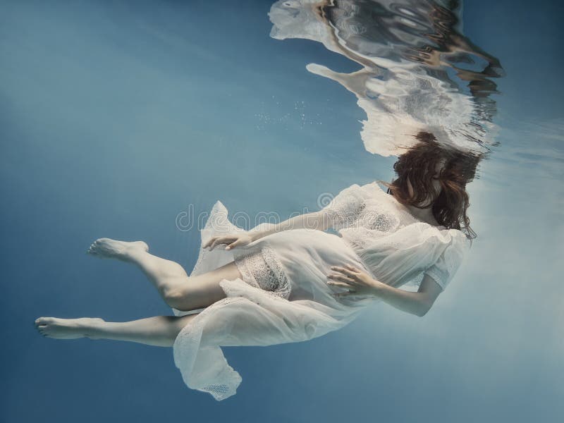 Girl in Dress Posing Underwater Stock Photo - Image of person ...