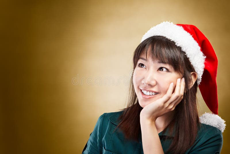 Girl daydreaming about Christmas