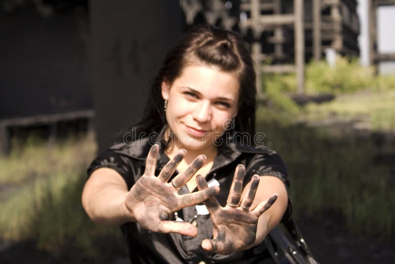 Girl with dirty hands