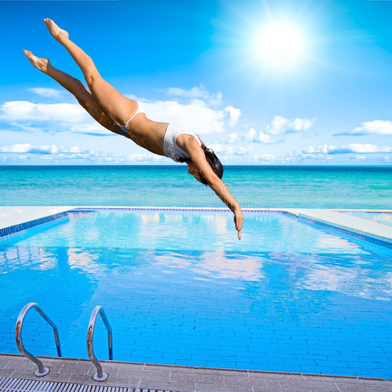 Girl diving into pool stock photography Girl diving into pool stock photography