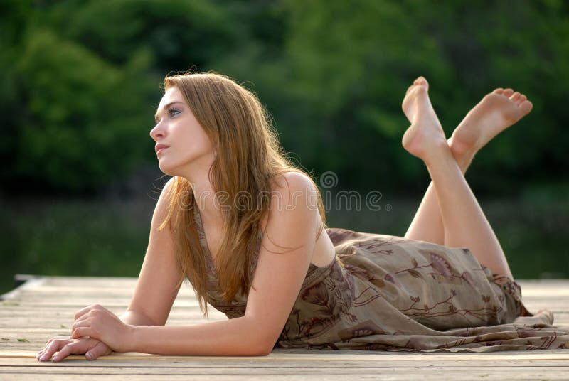 Girl On A Dock