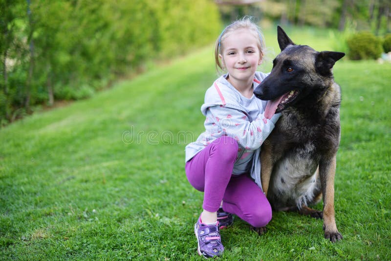 Girl and dog royalty free stock image