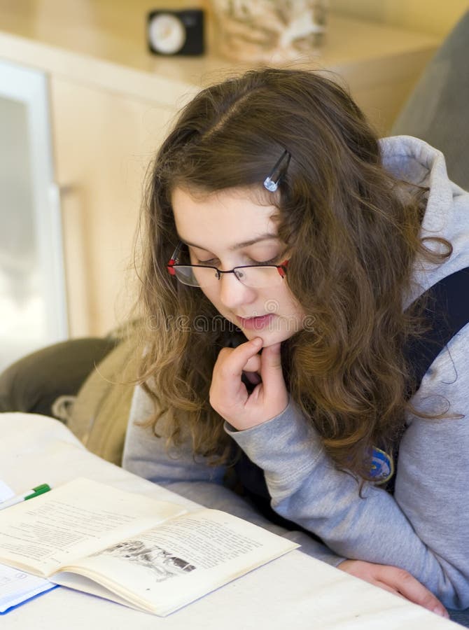 Girl doing homework stock photography Girl doing homework stock photography