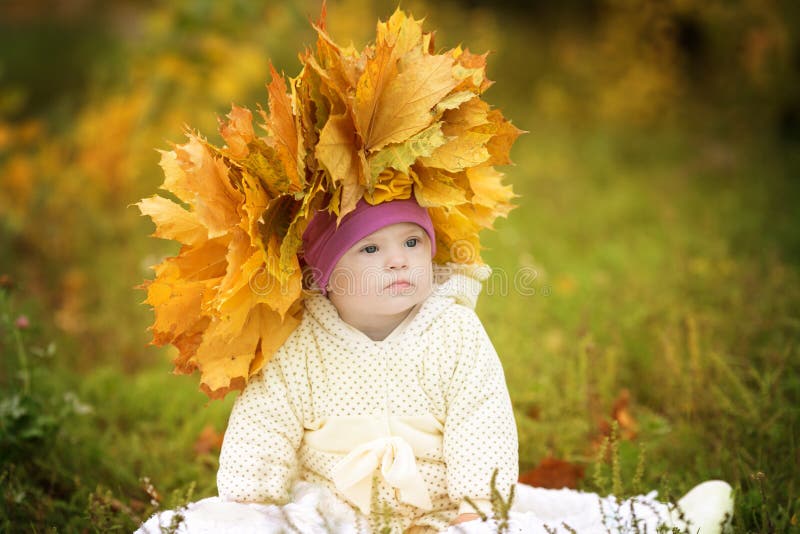 Girl with Down syndrome wore a wreath of spring leaves