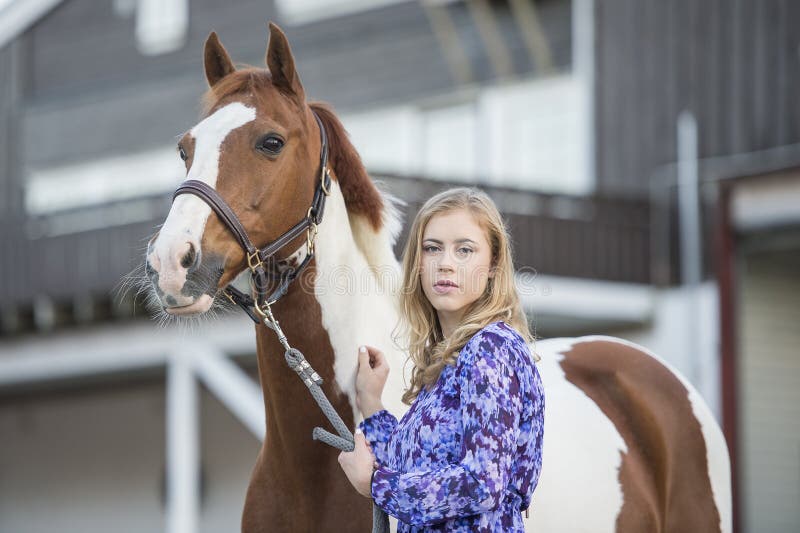 Girl in dress with horse stock image. Image of teenage 57955115