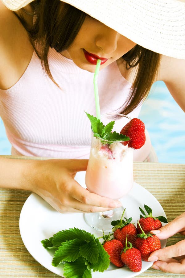 Girl drinking cocktail