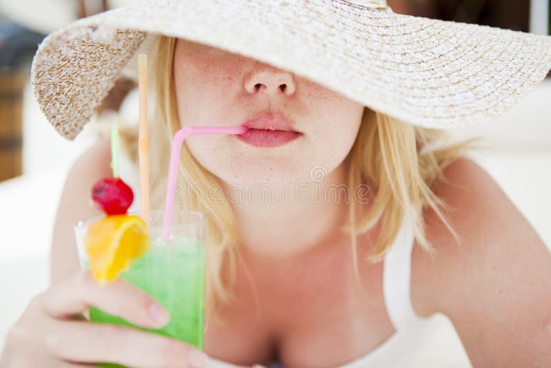 Girl drinking a coctail