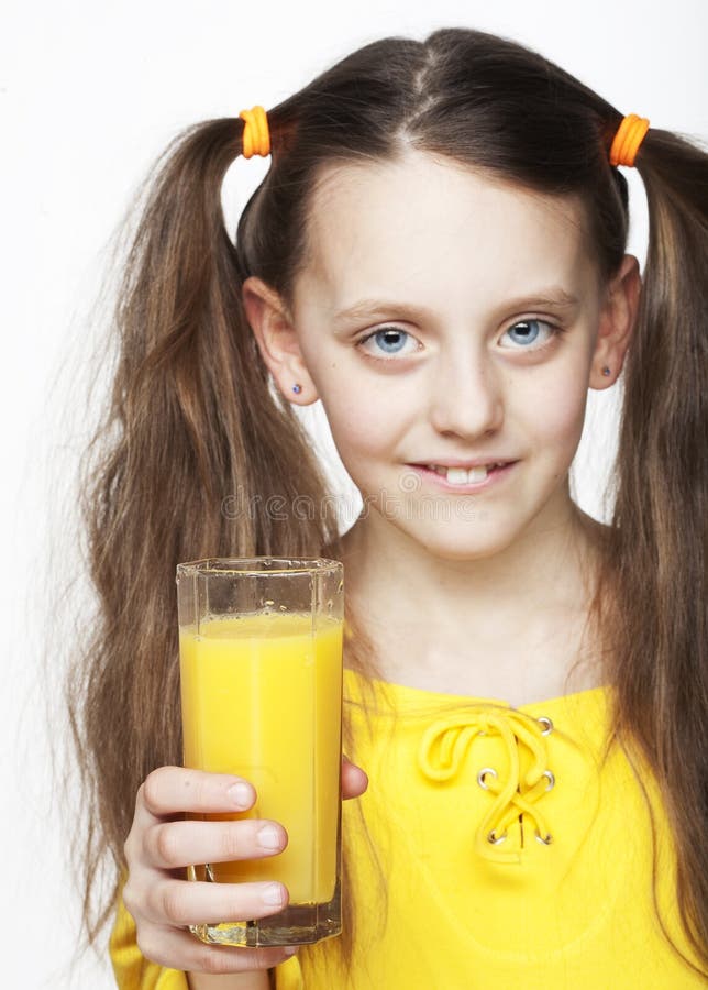 Girl drinking orange juice