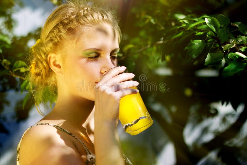 Girl drinking orange juice