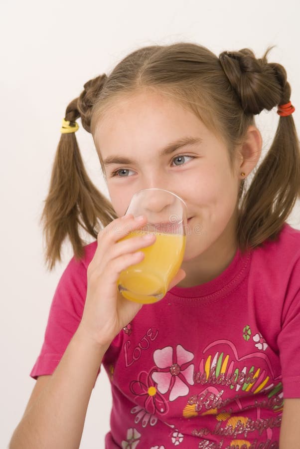 Woman Drinking Her Orange Juice Stock Photo Image of hold, blue 6787690
