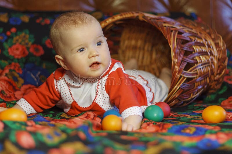 Girl in Easter basket stock image Girl in Easter basket stock image