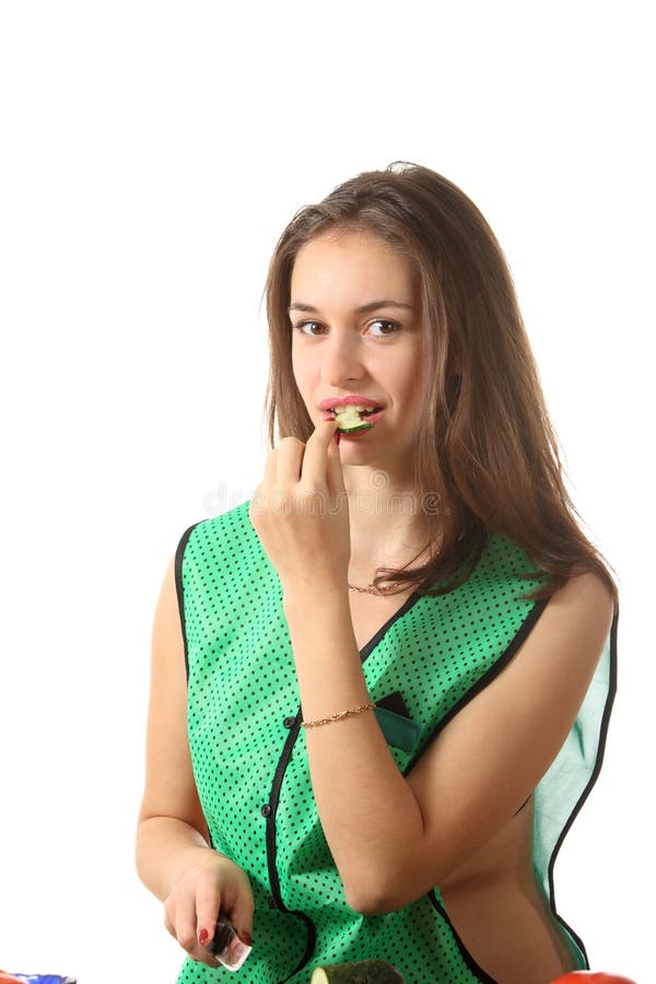 Girl eat cucumber