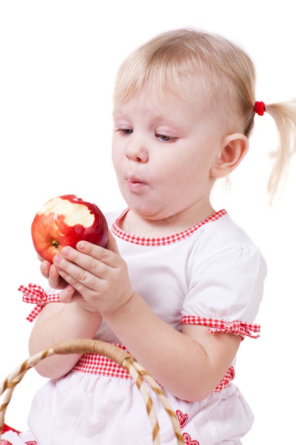 Pretty Little Girl Biting an Apple Stock Photo Image of hand, infant