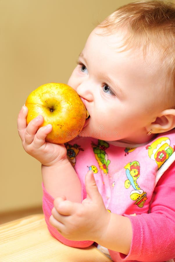 Girl eating apple stock photo. Image of baby, girls, healthy 18277184