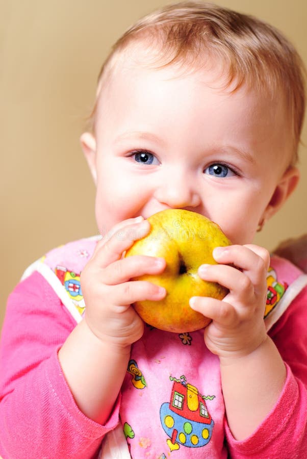 Girl eating apple stock image. Image of baby, child, cute 19549159