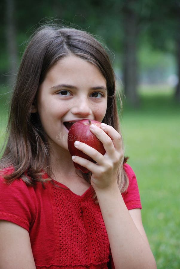 Girl Eating an Apple